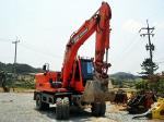 КОЛЕСНЫЙ ЭКСКАВАТОР DOOSAN DX140W 2010 год